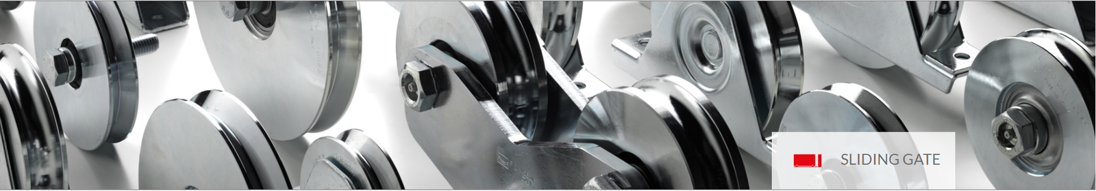 Detailed close-up of a heavy-duty sliding gate roller mechanism with steel bearings.